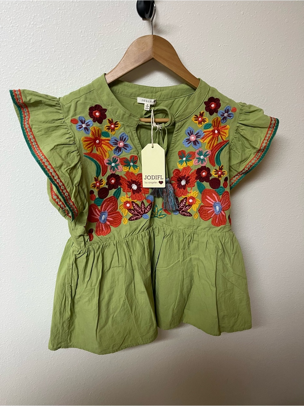 JODIFL Light Green Embroidered Flutter-Sleeve Peplum Top
